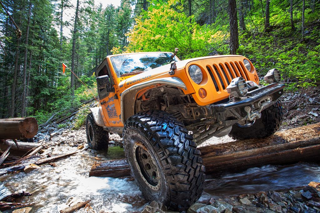 Orange Jeep Wrangler JT in its element